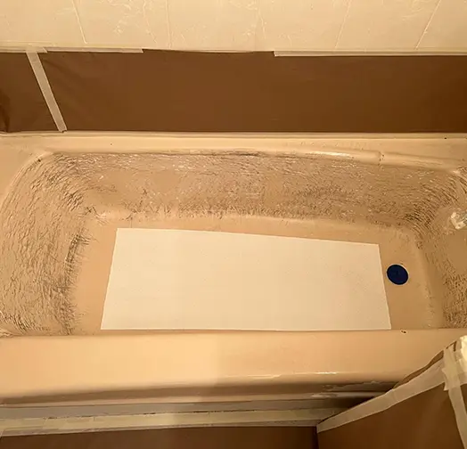 Bathtub surface being prepared for professional reglazing in Brooklyn